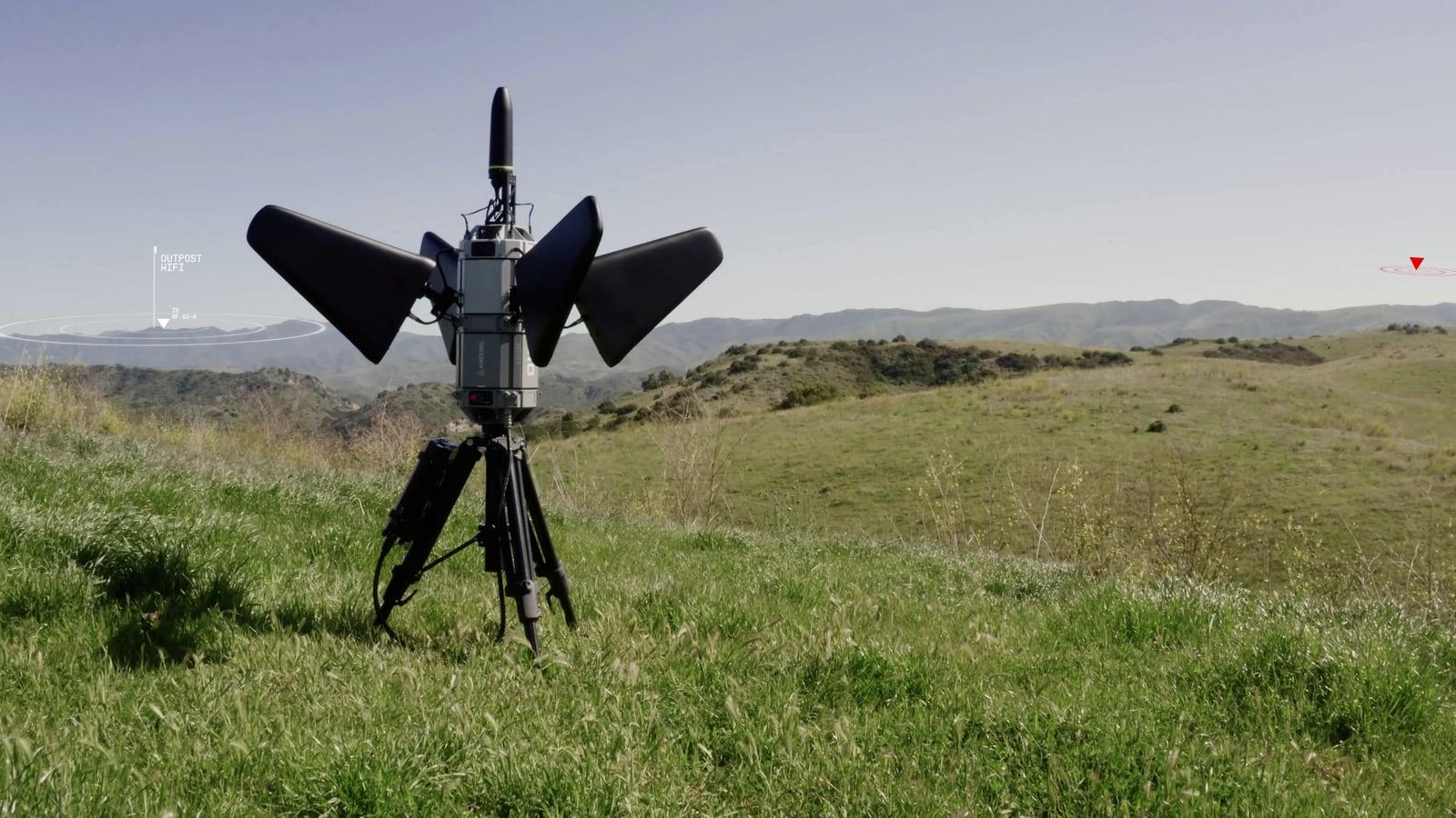 Pulsar with multiple antenna panels deployed on a tripod on open grassland