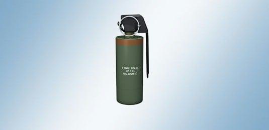 Olive green Rheinmetall MK13 stun grenade with black lever on a blue-grey gradient background